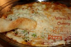 Close-up of pizza dip with melted mozzarella and pepperoni