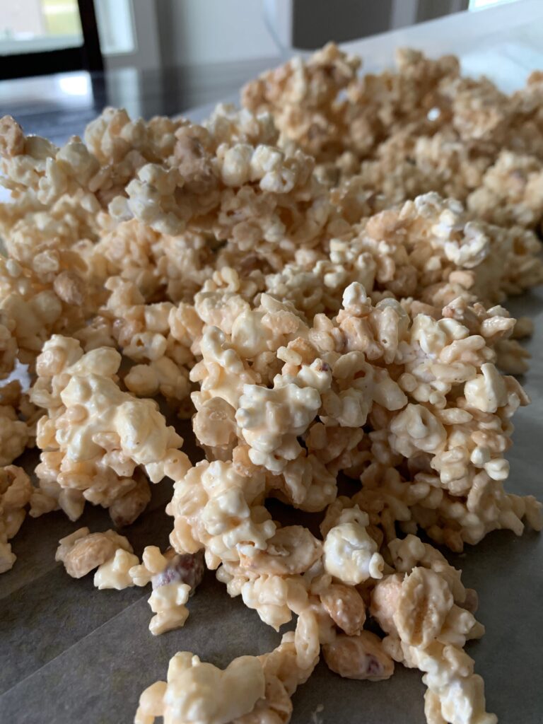 sweet and salty popcorn drying on wax paper