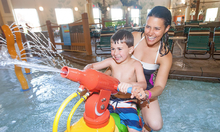 Mom and son playing at Great Wolf Lodge Hotels