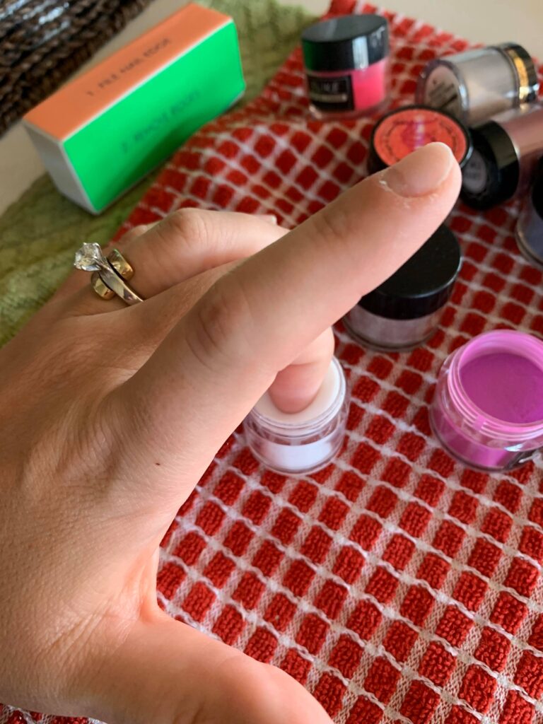 putting clear powder on gel dip nails